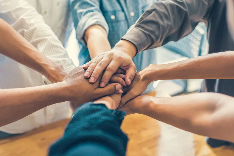 Trust - Group Hands Adobe Stock 109518239 1500w