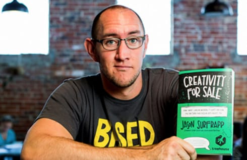 Jason SurfrApp holding RTC published book Creativity for Sale
