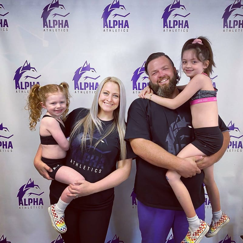 Kristen Cheer Family Kristen with husband and two daughters