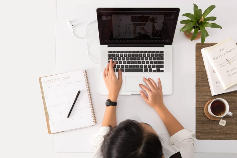 Repurposing Your Books Content into Blogs and Articles typing hands